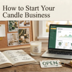 Here are all the WordPress image fields for the How to Start a Jar Candle Business blog banner: Alt Text: How to start a jar candle business — entrepreneur's desk with glass jar candle samples, handwritten brand logo sketches, colour swatches, an open notebook and laptop showing an e-commerce dashboard