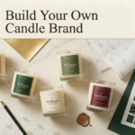 Private label candles manufacturer — luxury branded jar candles with custom labels, foil stickers, branded tissue paper and wax seal displayed on marble surface by Welburn Candles private label manufacturing service