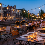 Tealight candles set on a Dutch restaurant terrace table at dusk